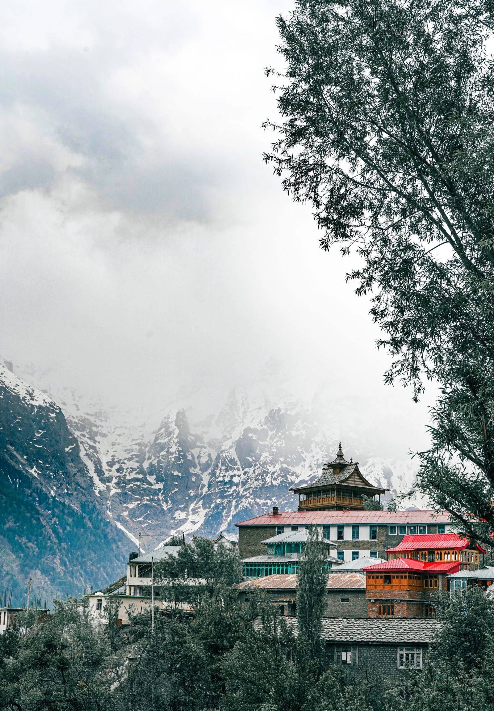 vertical-shot-lochawa-la-khang-monastery-kalpa-himachal-pradesh-cold-winter-scaled